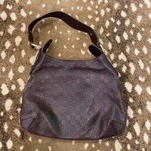 Gucci brown leather shoulder bag with zip closure and bridle sides